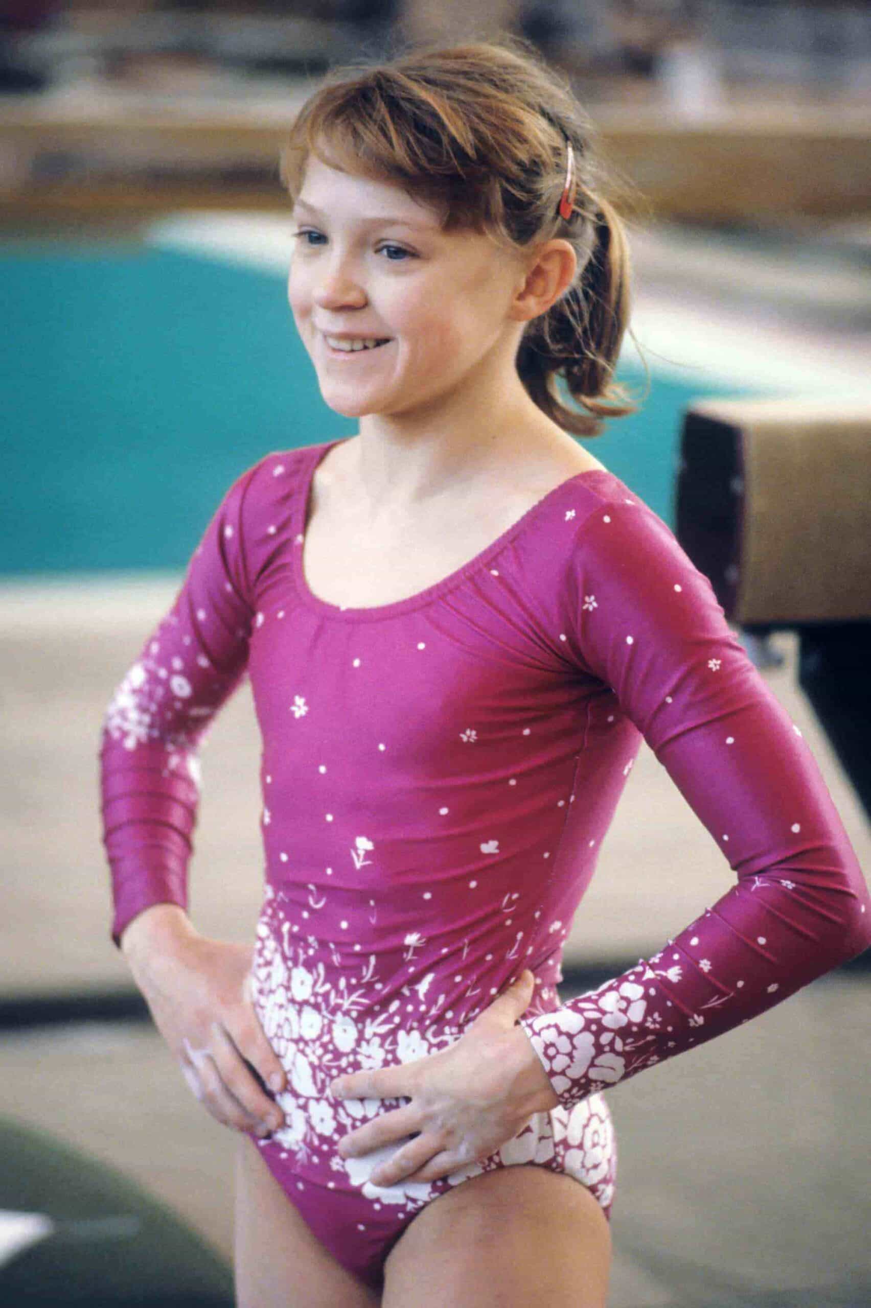 Елена Наймушина в розовом гимнастическом купальнике