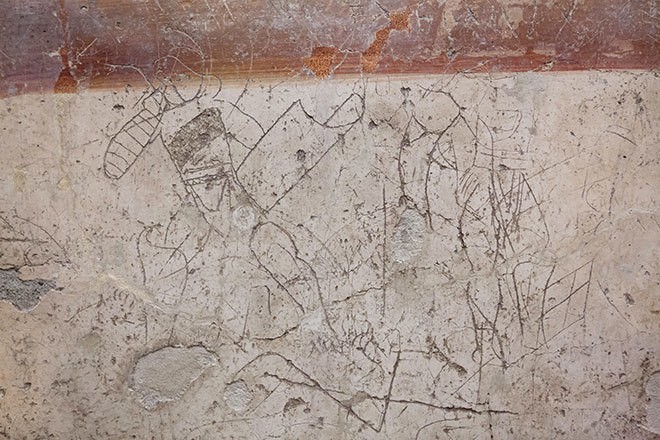 Граффити с изображением боя гладиаторов на стене в Помпеях &mdash; надпись I века нашей эры