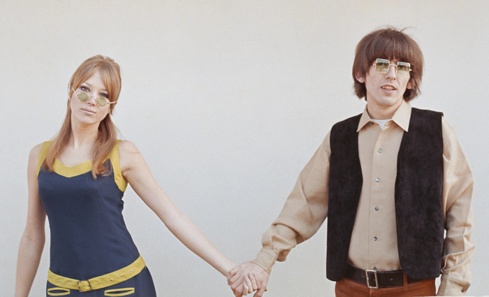 George Harrison of the Beatles and his then-wife, fashion model Pattie Boyd, during a photo shoot in London in January 1966