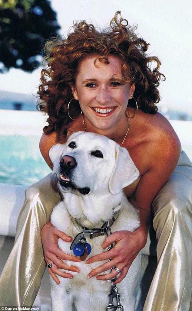 Ms Reid (pictured here with her dog, Ami, in 2000) was 24 when he sight was partially restored
