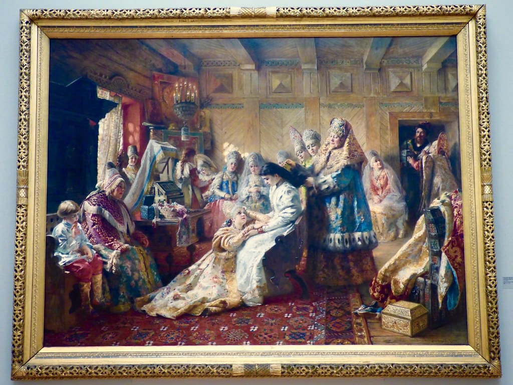 Константин Маковский. &laquo;Выбор приданого&raquo;, 1886. Семья оценивает вещи &mdash; девушка на заднем плане