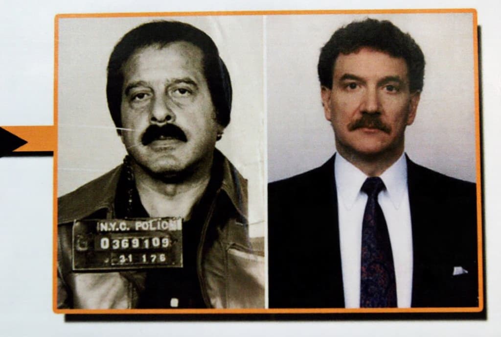 Photos of Colombo crime family capo Greg Scarpa Sr. (left) and former FBI agent Lindley DeVecchio are displayed during a news conference held by Brooklyn District Attorney Charles Hynes at his office regarding DeVecchio's indictment. 