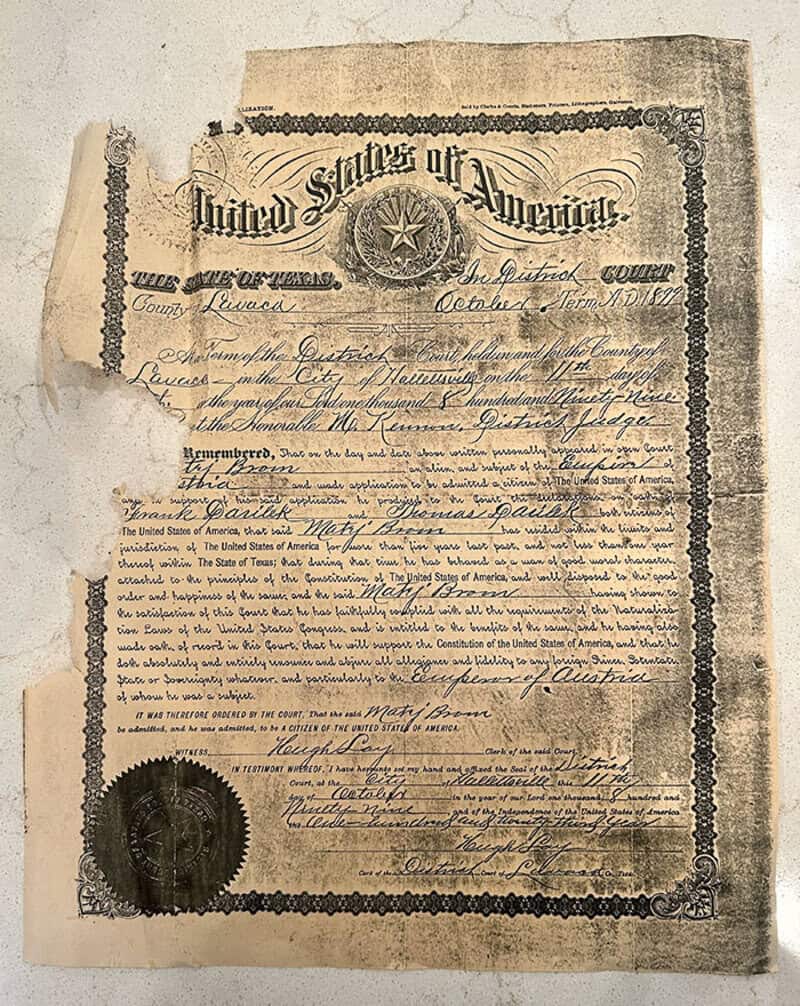 Порванное американское свидетельство о гражданстве 1899 года с печатью